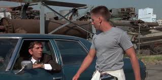 Otto goes through glove compartment, puts on pair of sunglasses. Repo Man 1984 Midnight Movie The Goug Blog