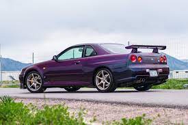 Maybe you would like to learn more about one of these? You Can Buy This Legal Midnight Purple R34 Skyline Gt R Right Now
