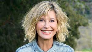 The singer and actress is battling breast cancer for the third time. Olivia Newton John Still Believes