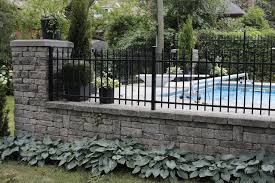 Field Stone Wall With Ornamental Iron