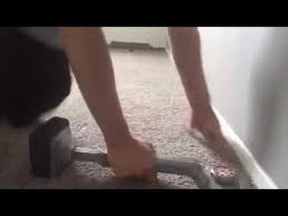 how to stretch carpet with a knee