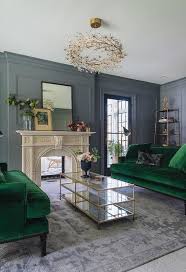 emerald green velvet sofas with br