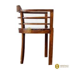 The most common 1960 teak furniture material is wood. Rounded Vintage Teak Wood Chair