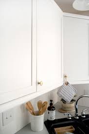 add trim and paint your laminate cabinets