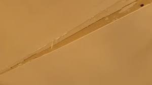 repair a loose tape joint in drywall