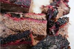 What is the best temperature to smoke a brisket?