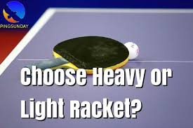 choose heavy or light racket which