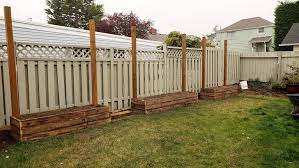 diy raised garden bed with privacy fence