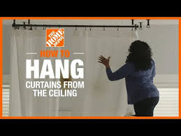 hanging curtains from the ceiling the
