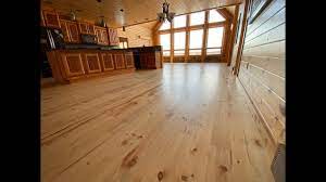 rough sawn pine floor that needs a lot