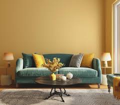 Blue Sofa And Yellow Wall