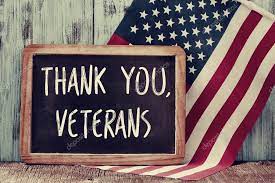 Text thank you veterans in a chalkboard and the flag of the US Stock Photo by ©nito103 87753478