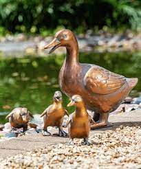 Four Piece Duck Family Statue Set
