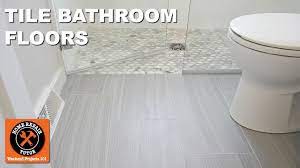 how to tile a bathroom floor next to