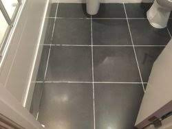 advice on cleaning black bathroom tiles