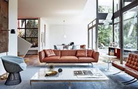 brown leather couches open windows