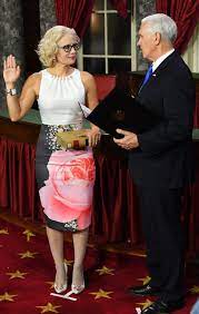 Kyrsten sinema is a successful american politician from the democratic party, who won 3 times arizona state representative from 15th districts of arizona house of representatives. Kyrsten Sinema Is Senator Madonna Because Of Her Dress Get Over It