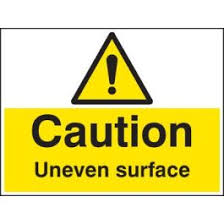caution uneven surface safety signs