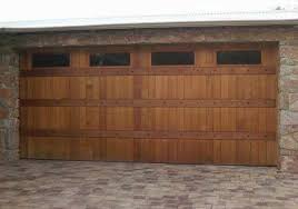 Wood garage doors can last a long time, but they require regular maintenance to prevent the wood from rotting. Timber Look Garage Doors Dandenong Garage Doors