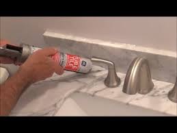 how to apply silicone behind a faucet
