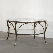 elegant coffee table in glass brass
