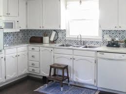 Then, look for paint colors in the same family, so that the cabinets and walls don't compete with each other. that doesn't mean, says spak, that the colors should blend into each other. Painting Oak Cabinets White An Amazing Transformation Lovely Etc