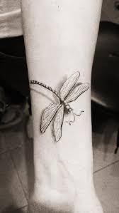 I like the jewelry pieces attached to the dragonfly as well. 125 Elegant Dragonfly Tattoo Designs And Ideas