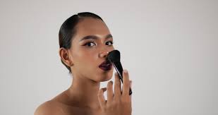 beauty asian woman makes makeup