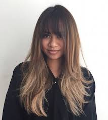 With this haircut, the bangs are front and center. 21 Cute Effortless Long Hairstyles With Bangs And Layers Hairstyles Weekly