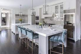 Add extra seating to your kitchen or dining room with counter height barstools for your amisco's lincoln swivel counter or bar stool is the perfect addition to your modern kitchen space looking to add personality with its slender metal. Gray Kitchen Island With Blue Velvet Tufted Counter Stools Contemporary Kitchen