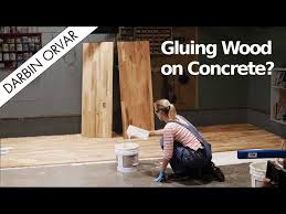 glue hardwood flooring to concrete
