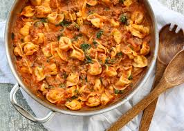 sausage tortellini and spinach in a