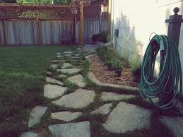 lay a flagstone walkway in an existing lawn