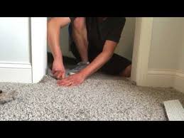 a carpet seam with a utility knife