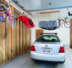 I think overhead garage storage is the answer to my clutter problem. Top 7 Best Garage Storage Lifts Garage Ceiling Storage Lift