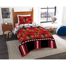 Since the bed is the centerpiece of the room, make a statement with a frame or headboard in unexpected materials: Nhl Chicago Blackhawks Bed In A Bag Comforter Set Bed Bath Beyond