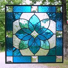 aqua blue geometric stained glass panel