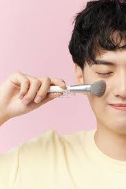 korean male hand holding makeup brush