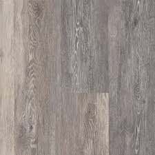 Adura® vinyl plank flooring is designed to be lived on. Limed Oak Luxury Vinyl Tile Chateau Gray A6714
