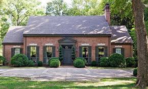 Red brick and black siding for a bold contemporary exterior Red Brick Houses With Black Trim Design Indulgence