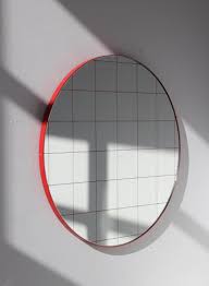 orbis mirror with red frame and grid by