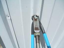 nail puller attachment for a slide