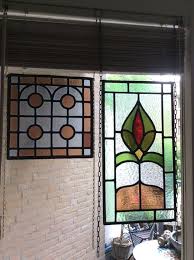 two stained glass window panels