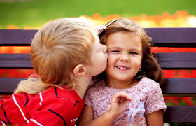 cute baby couple kiss at the