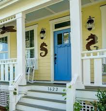 blue front doors with coastal curb