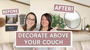how to decorate above your sofa