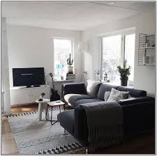 living room decor with dark grey sofa