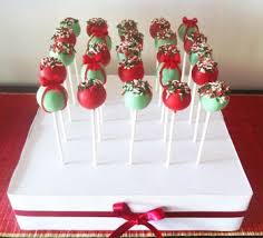 Have your cake and eat it to0. Christmas Cake Pops In Stand Christmas Cake Pops Cake Pop Displays Christmas Cake