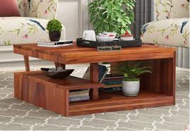 You will no doubt need some seating options incorporated into your living room design, which can range from small accent chairs to a big roomy sectional. Coffee Center Table Online Buy Latest Designer Coffee Table At Low Prices Wooden Street