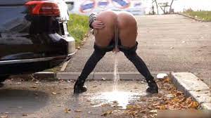 Girls pissing compilation: piss from behind - in public by cars - xcavy.com